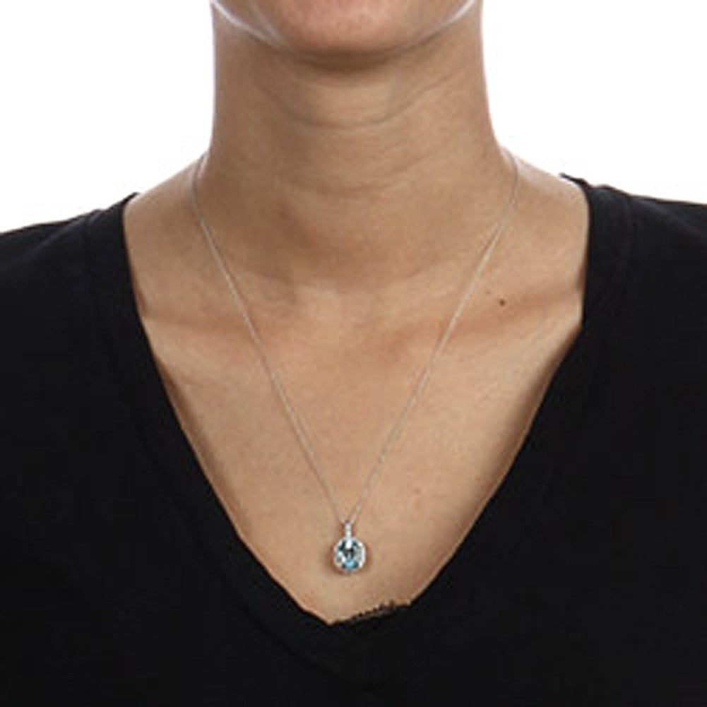 10k White Gold Oval Blue Topaz and Diamond Halo Pendant Necklace